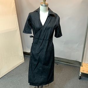 Dark stiff denim wrap dress with leather detail